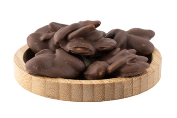 Roche chocolates with almond milk in a wooden bowl