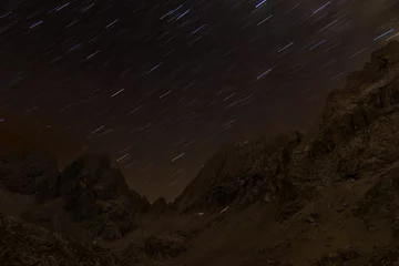 Photo sur Plexiglas Chocolat brun Star trails above alpine landscapes
