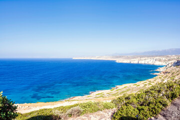 Fototapeta na wymiar Rocky shoreline near the east coast of Crete, Greece