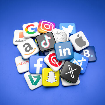 Companies or services affected by the Digital Services Act of the European Union. Logos on a heap on a table. Amazon, TikTok, Facebook, Instagram, LinkedIn a.s.o.