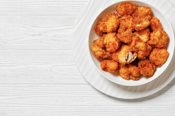 crispy fried panko breaded chicken bites in bowl
