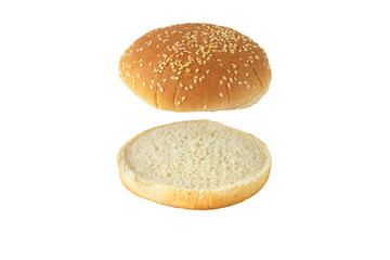 Sesame bun for burger top and bottom separated isolated transparent png. Round bread topped with...