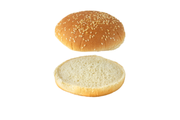 Sesame bun for burger top and bottom separated isolated transparent png. Round bread topped with sesame seeds cut in half.
