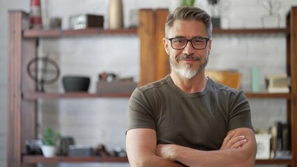 Portrait of happy, confident middle aged man in casual, smiling