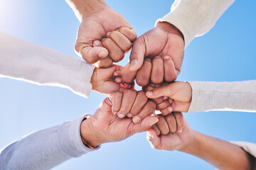 Hands in circle, blue sky and diversity for community in collaboration for global support and...