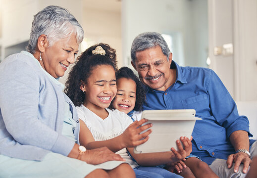 Family. grandparents and children on tablet for selfie, video streaming and e learning, online education or games on sofa. Senior people and kids on digital technology for profile picture photography