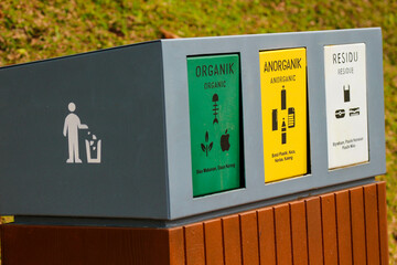 The trash can is divided into 3 parts, organic inorganic and residue.