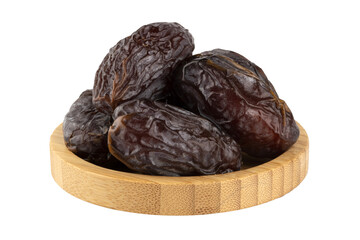 Jumbo dates in a wooden bowl