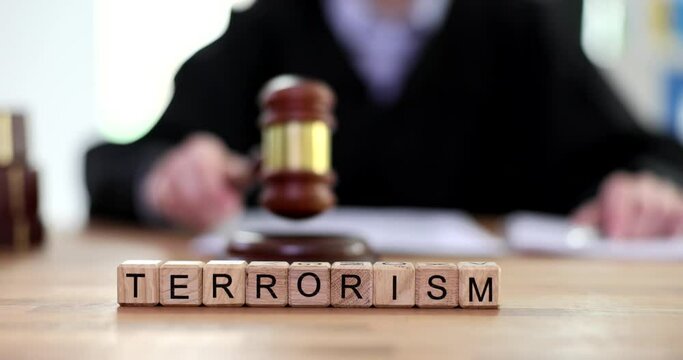 Word terrorism and judge of judgment table. International terrorism and global problem