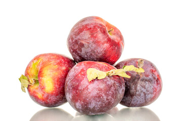 Several ripe juicy red apples, macro, isolated on white background.
