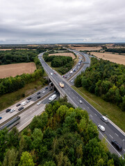 Aerial vertical landscape of traffic jam on the M1 motorway - obrazy, fototapety, plakaty