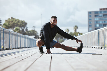 Exercise, outdoor and man stretching, fitness and workout with warm up, freedom and training with health. Athlete, person or runner with wellness, stretch or sports with practice in a city and energy