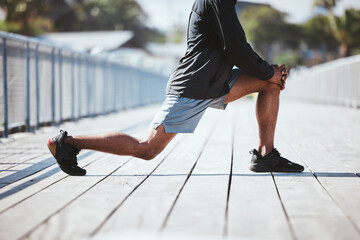 Closeup, city and man stretching, legs and training with warm up, sports and workout with wellness....