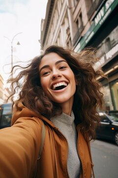 beautiful hispanic woman smiling confident doing a selfie