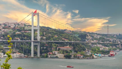 Foto op Plexiglas Aerial sunrise shot of Istanbul city from Fethi Pasha Grove overlooking Bosphorus strait, with Bosphorus Bridge, or Bogazici Koprusu, connecting Europe and Asia, Istanbul, Turkey © Khaled El-Adawi