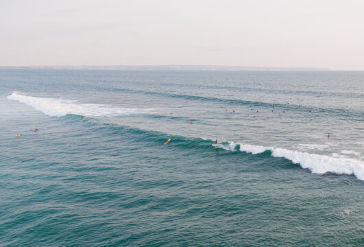 Surfer riding a wave in Batu Bolong, Old's Man, Canggu, Bali, Indonesia
