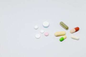 Various forms and sizes of pills