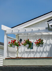 bungalow balcony with hanging flowers