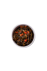 Delicious marinated seaweed with paprika, spices and salt