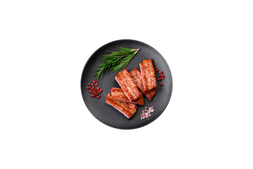 Grilled fresh juicy ribs with salt, spices and herbs