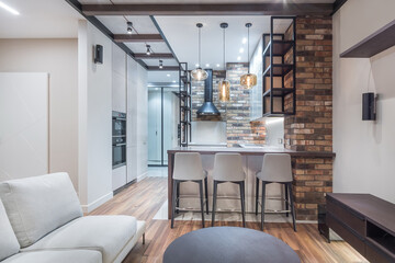 Studio apartment with modern interior design. Exclusive decoration of the room. Stylish furniture and accessories.