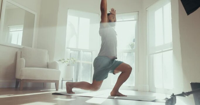 Relax, yoga and stretching with man in living room for spiritual, mindfulness and fitness. Mental health, zen and wellness with person and workout at home gym for peace, meditation and balance