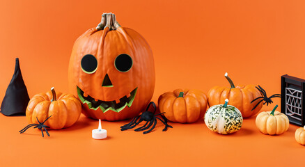 scary halloween decoration in orange background with pumpkins with face in high resolution and sharpness. concept october halloween 31 scary