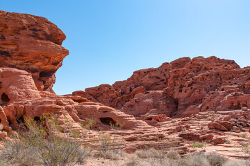 Exterior view of windstone arch and fire cave in Valley of Fire State Park, Mojave desert, Nevada,...
