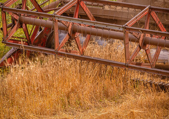 combine harvesting wheat
