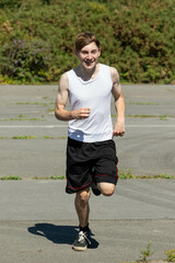 Teenage boy running during summer