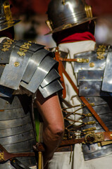 Naklejka premium Roman legionary soldiers at historical reenactment festival