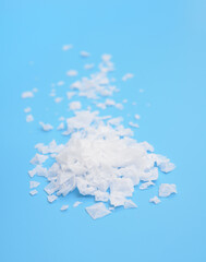 Pyramide Crystal Flakes of Cyprus Salt on blue background