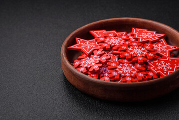 Empty ceramic black plate with christmas decoration elements