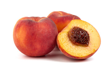 Naklejka na ściany i meble Fresh peaches and juicy slice, isolated on white background.