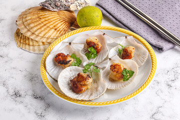 Grilled scallops shell with butter