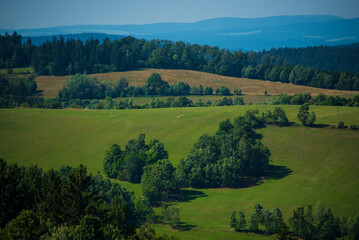 Fototapeta na wymiar beautiful landscape with green hills and fields