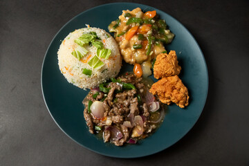 Special Food Set Menu fried chicken, fried rice, mixed vegetable served in dish isolated on background top view of bangladesh and indian food