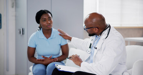 Fototapeta premium African Medical Doctor Talking To Patient