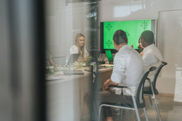 Multigenerational Business Team Analyzing Statistics and Planning Profit Growth