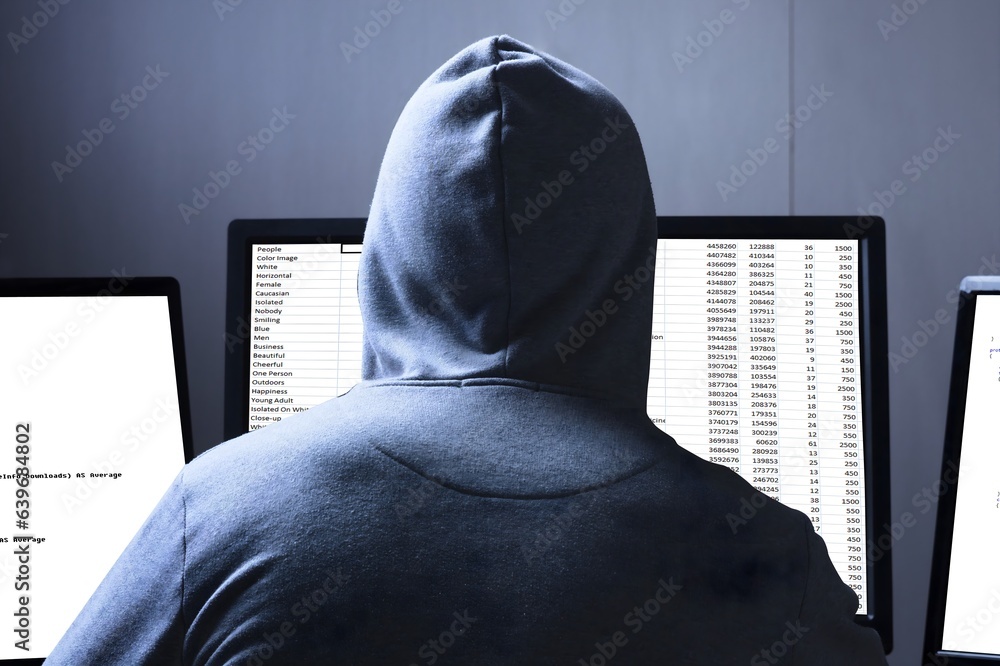 Fototapete Hacker Using Multiple Computers For Stealing Data