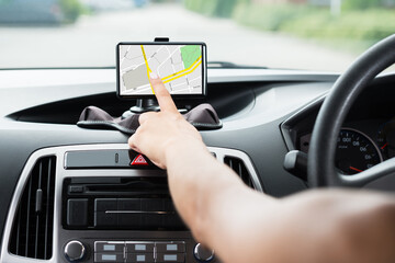 Female's Hand Using GPS Navigation