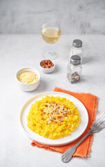 Pumpkin risotto with fried bacon