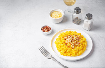 Pumpkin risotto with fried bacon