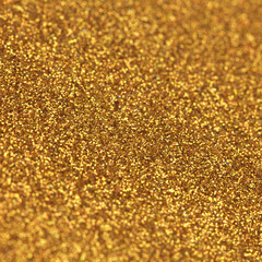 Glittery bright shimmering abstract background made out of shiny crystal colored sequins, perfect as a golden backdrop that sparkles