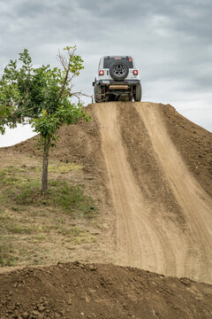 Loveland, CO, USA - August 25, 2023: Jeep Wrangler, Rubicon model, on a dusty training drive off-road course.