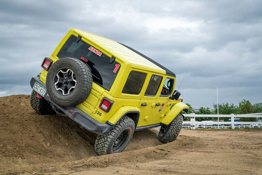 Loveland, CO, USA - August 25, 2023: Jeep Wrangler, Rubicon model, on a dusty training drive off-road course.