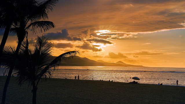Sunset view at Playa de Las Canteras beach at Las Palmas de Gran Canaria, Spain