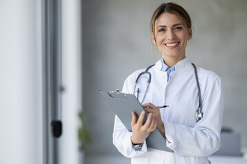 Portrait of female doctor in her office