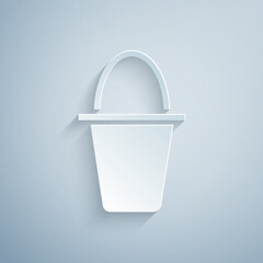 Paper cut Fishing bucket icon isolated on grey background. Fish in a bucket. Paper art style. Vector