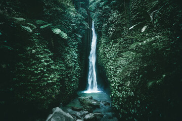 Amazing waterfall near Ubud in Bali, Indonesia.  Secret Bali jungle Waterfall - 639695491